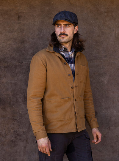 Man in a Grey Newsboy cap