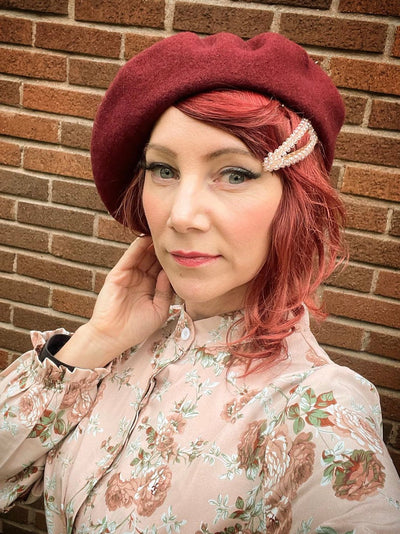 Woman with a wine red Beret