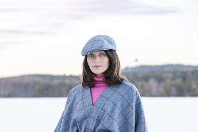 Woman in a blue & pink Tweed Flat cap 