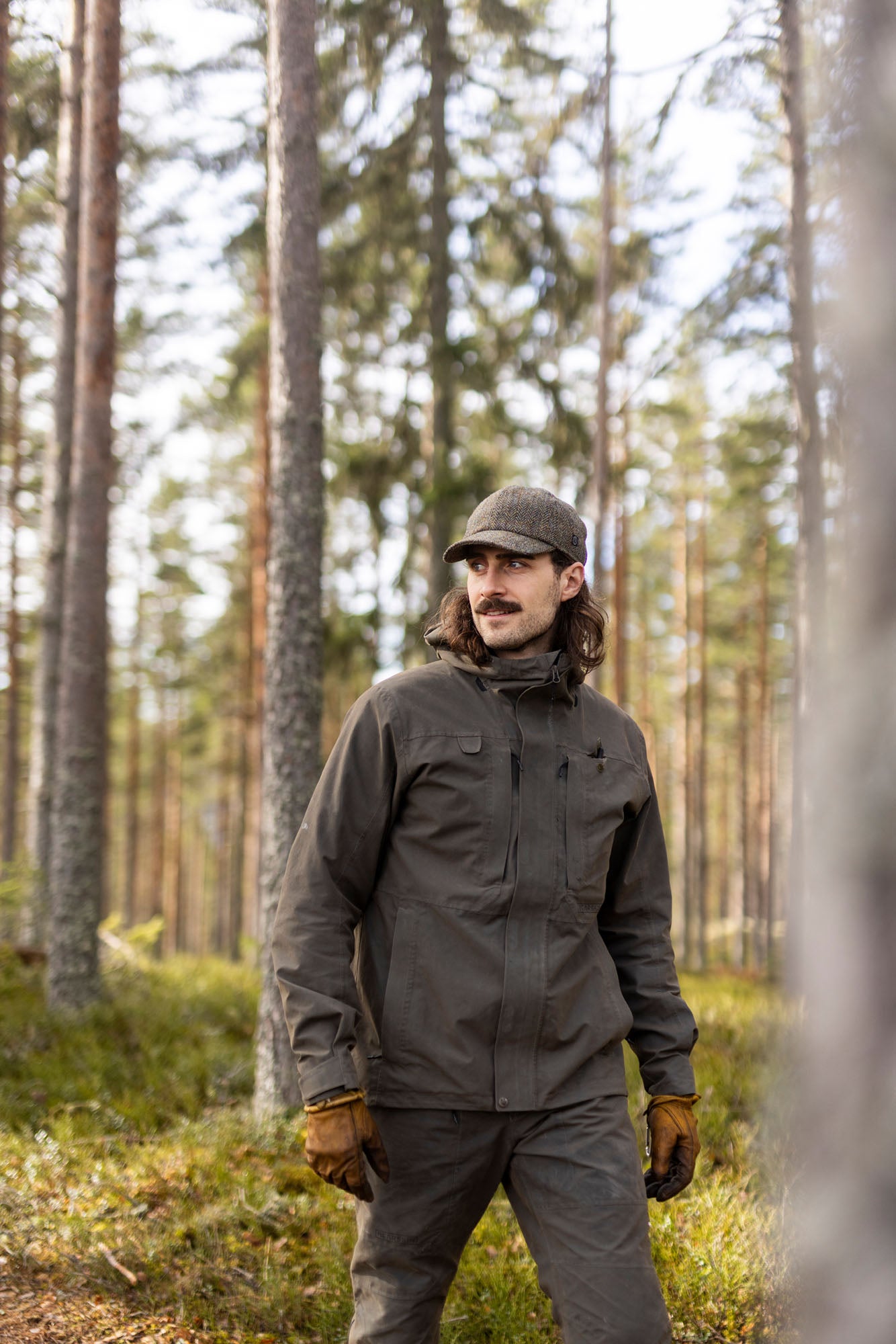 Man in Green Tweed Harris hunting hat