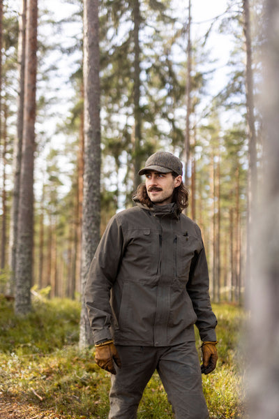 Man in Green Tweed Harris hunting hat